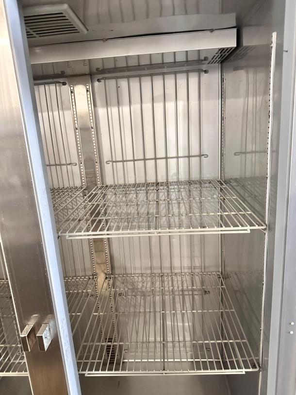 Beverage-Air Horizon Series HF2HC-1S two-door reach-in refrigerator in outstanding condition, showing interior racks.
