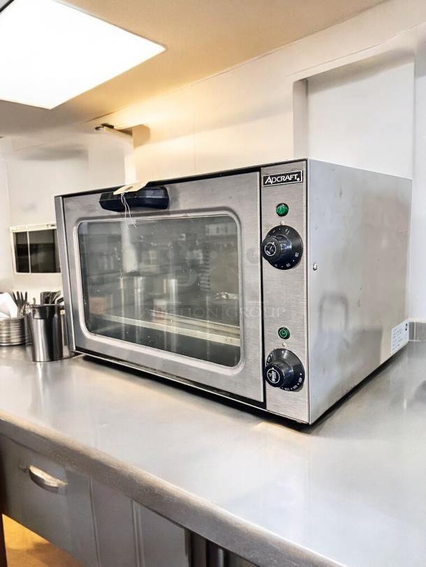 Adcraft COQ-1750W countertop convection oven, stainless steel, superb condition, 120V, fully tested, visible control dials.