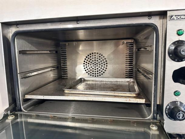 Adcraft COQ-1750W countertop convection oven, stainless steel interior, superb condition, fully operational, 120V, with controls.