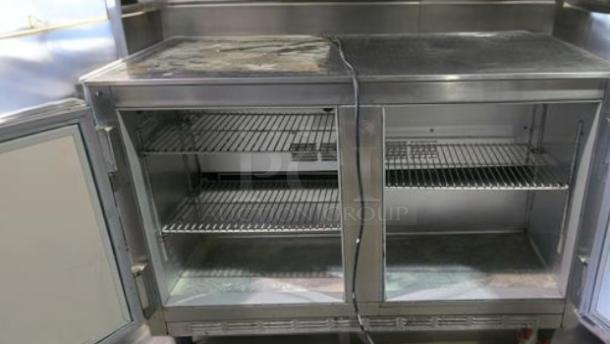 Beverage-Air UCR40 undercounter refrigerator in superb condition, 40" wide, stainless steel, dual doors, wire shelving, 115V.