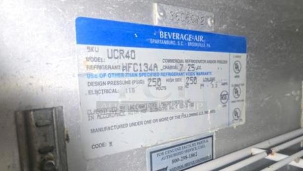 Label on Beverage-Air UCR40 undercounter refrigerator, detailing model, SKU, refrigerant type HFC134a, and 115V electrical specs.