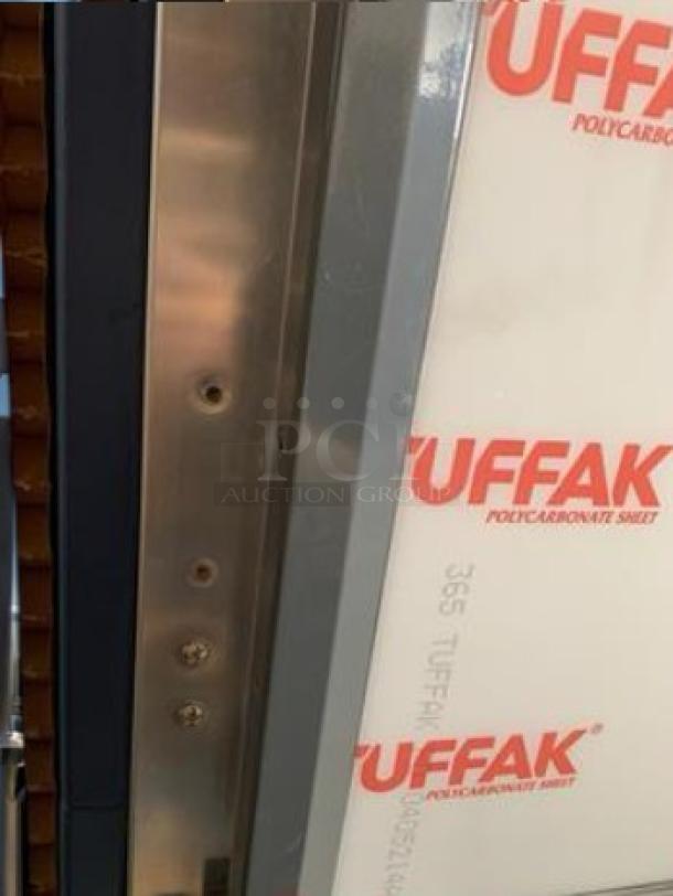Metro C5HMEO4 heated holding cabinet in like-new condition, showing the metal exterior and Tuffak polycarbonate panel.