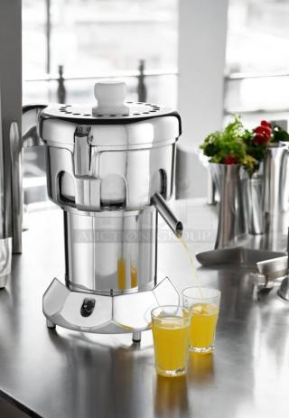 Remarkable condition Ruby 2000 commercial juice extractor, stainless steel, 115V, by Ruby Manufacturing Co., fully tested.