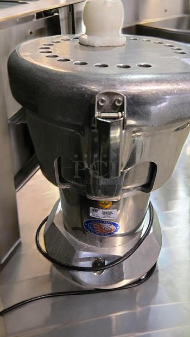 Ruby 2000 juice extractor by Ruby Manufacturing Co., stainless steel, great condition, 115V, commercial use, tested working.