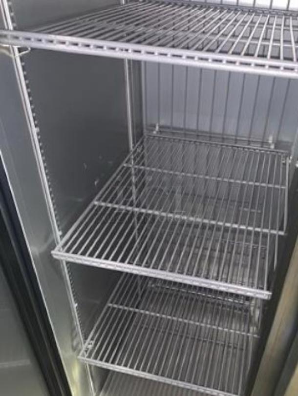 True T-35F-HC commercial double door reach-in freezer in immaculate condition with adjustable shelves, 115V, fully tested.