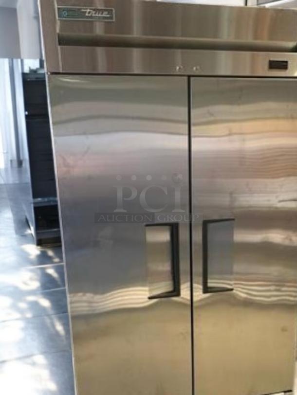 True T-35F-HC double door reach-in freezer. Stainless steel, immaculate condition. Brand logo visible. Fully tested, 115V.
