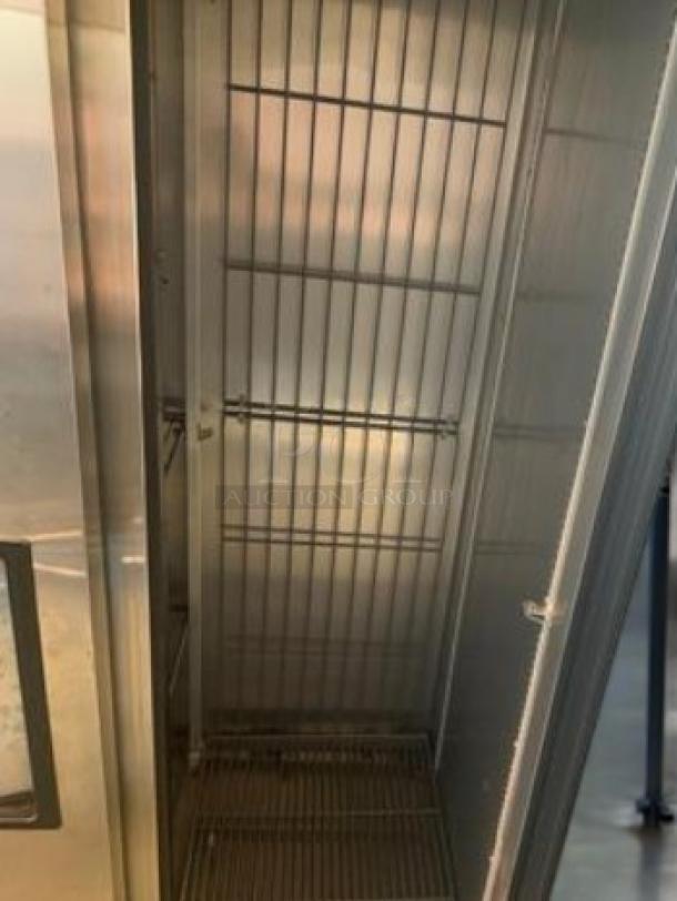 True T-35F-HC commercial double door reach-in freezer interior, pristine condition, stainless steel shelves visible.