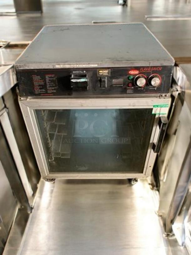 Hatco FSHC-6W2 Flav-R-Savor Holding Cabinet, top-tier condition, 120V, black control panel, glass door, fully tested.