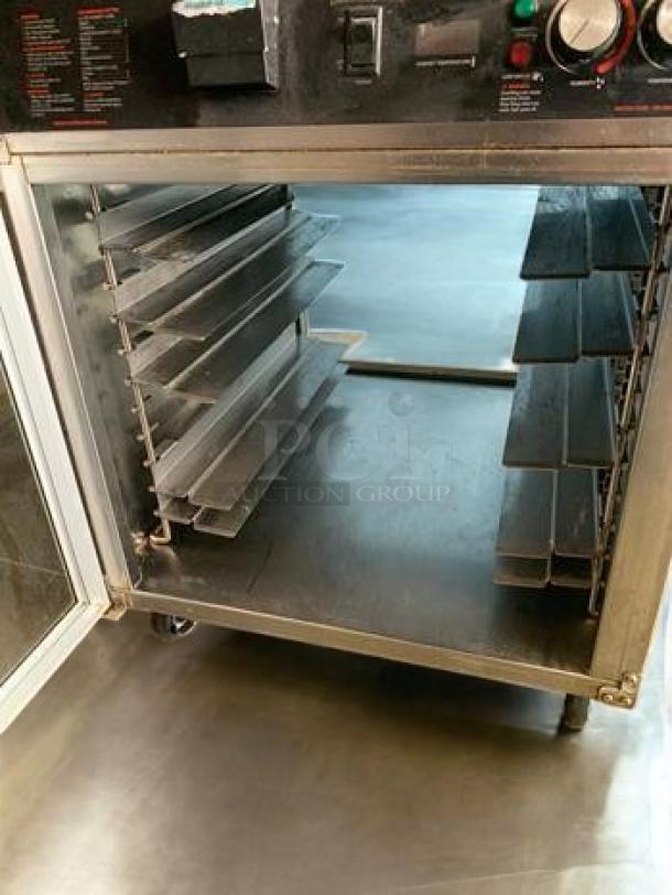 Hatco FSHC-6W2 Flav-R-Savor Holding Cabinet, top-tier condition, open view, metal racks, 120V, fully tested.