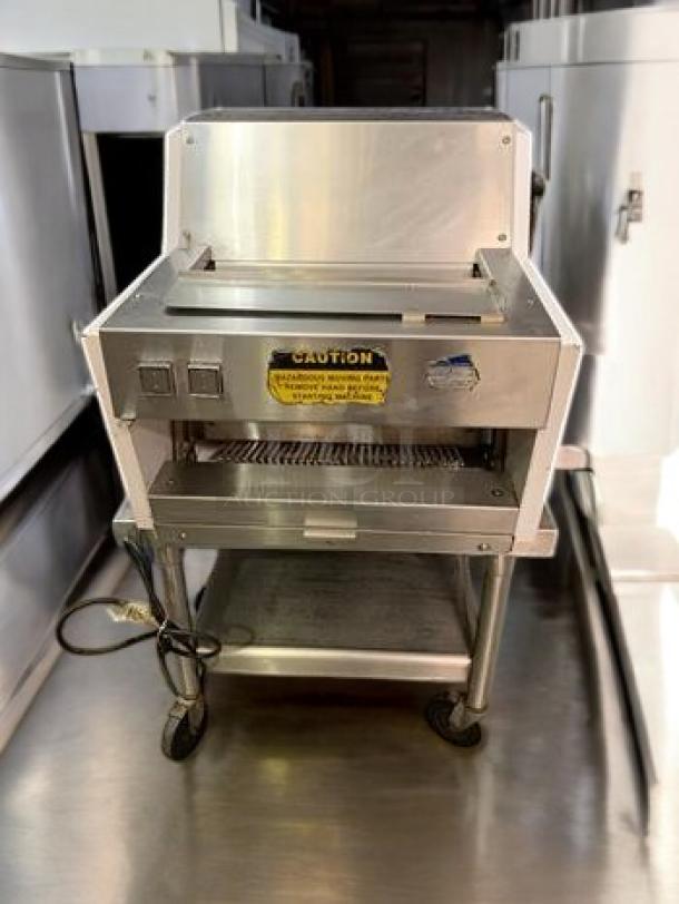 Oliver 711 commercial bread slicer in superb condition, 115V, fully tested and working, with caution label and stainless steel finish.