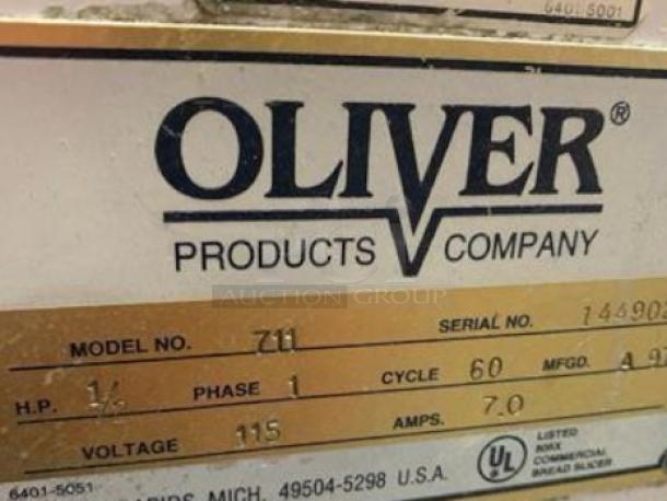 Oliver 711 commercial bread slicer in superb condition, 115V, tested and working, with manufacturer label visible.