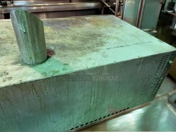 Outstanding condition gas deck pizza oven, single deck, commercial model, fully tested and operational, visible chimney.