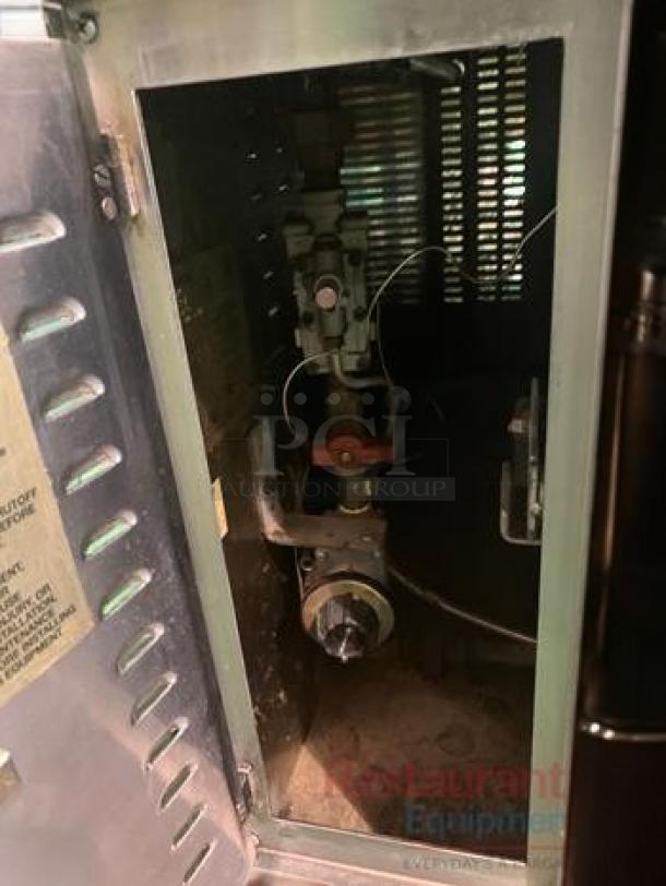 Commercial gas deck pizza oven, outstanding condition, single deck, interior view showing controls, fully tested and working.