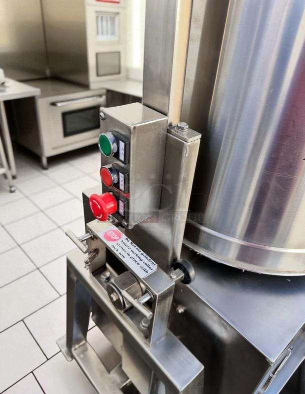 CocoaTown ECGC-65A-AV cacao grinder in outstanding condition, stainless steel, with operational buttons and safety label, 220V.