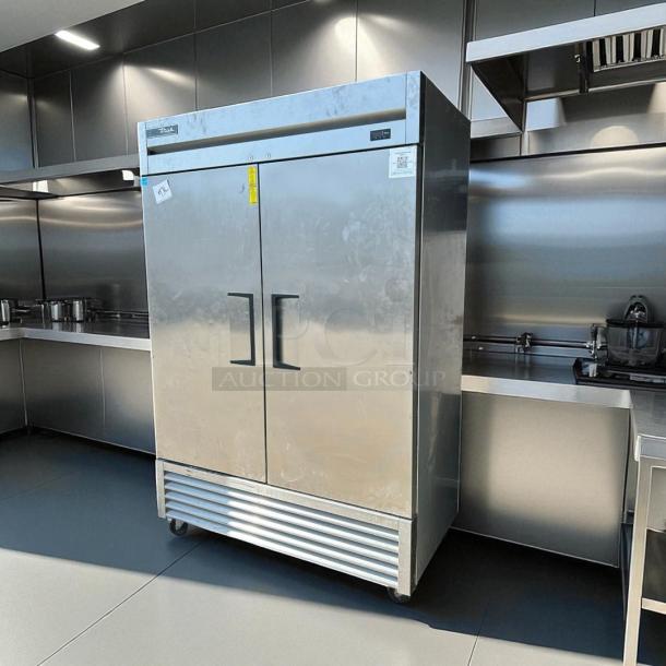 True T-49F-HC 2-Door Reach-In Freezer, superb condition, 115V, fully tested, stainless steel, visible True logo and control panel.