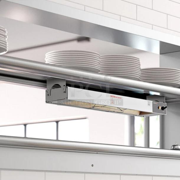 Brand new ServIt 36" strip warmer in packaging, single toggle control, 120V, 850W. Industrial design, labeled caution for hot surface.