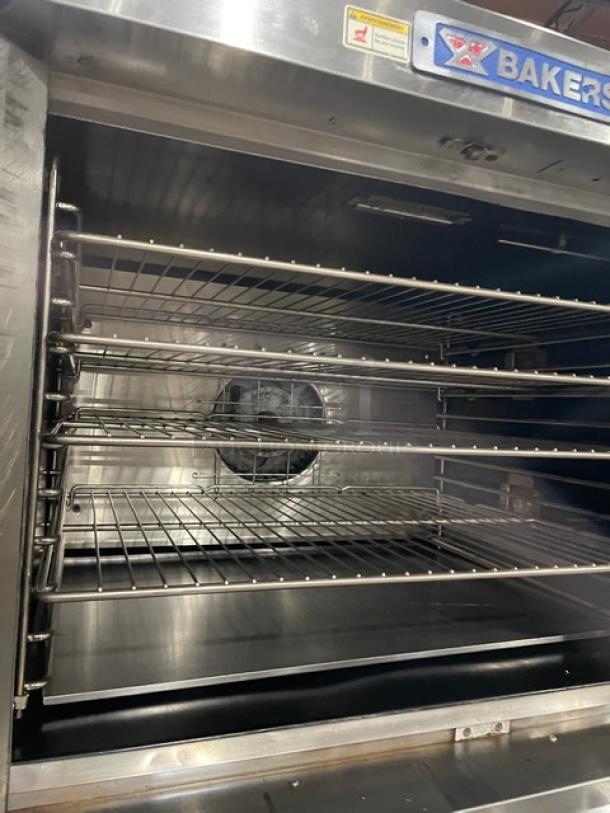 Bakers Pride Cyclone Series double convection oven, stainless steel, thermostatic control, wired rack, on casters, used.