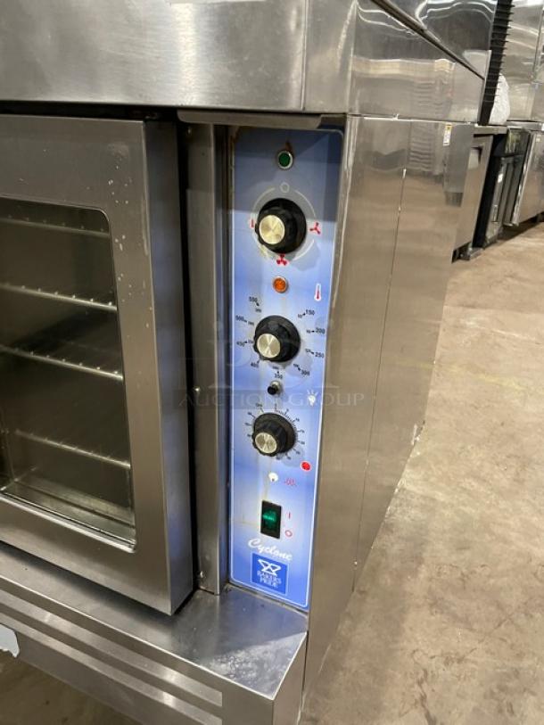 Bakers Pride Cyclone Series stainless steel double stack convection oven, electric, thermostatic controls, wired rack, on casters.