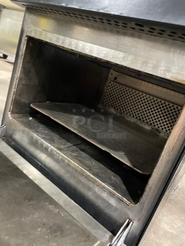 MerryChef Eikon E2S countertop rapid cook oven, electric-powered, 208/240V, black, visible wear, open cavity view.