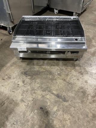 Therma-Tek stainless steel countertop char broiler, natural gas, with back and side splash, on legs, used condition.
