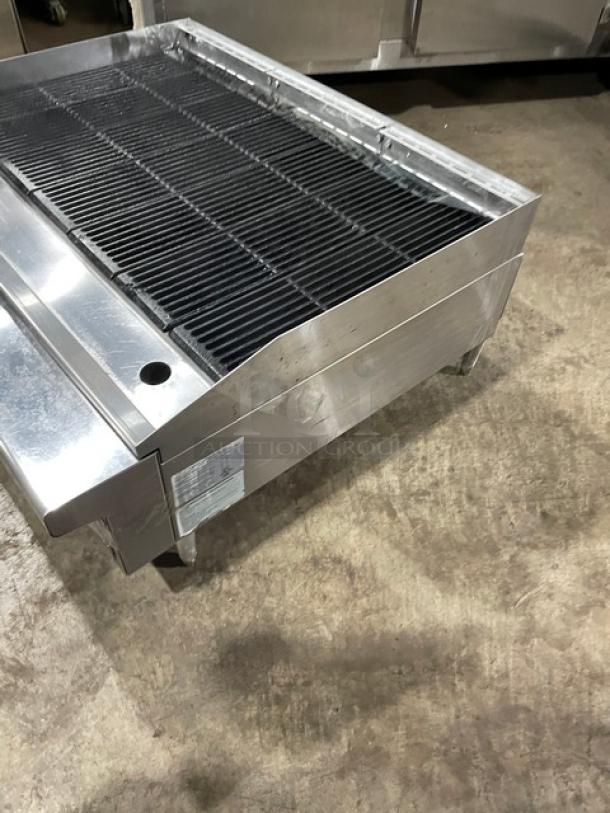 Therma-Tek stainless steel natural gas countertop charbroiler with back and side splash, on legs; excellent condition.