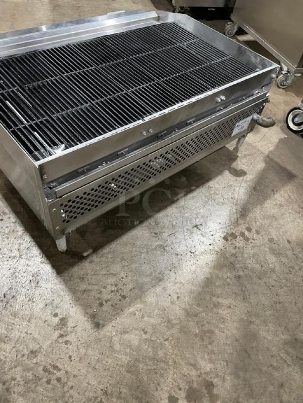 Therma-Tek stainless steel natural gas countertop char broiler, features back and side splash, legs, visible excellent condition.