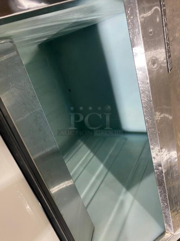 Maxx Ice MIM452 stainless steel ice machine/bin combo, electric-powered, 115V, 1 phase, visible clean interior, on legs.