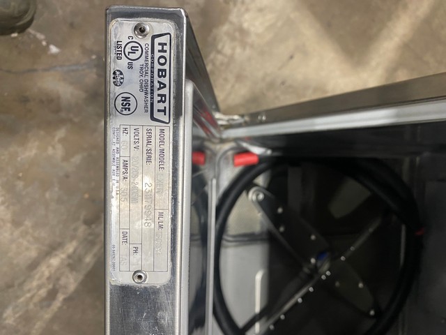 Commercial dishwasher specification plate showing voltage and amperage requirements