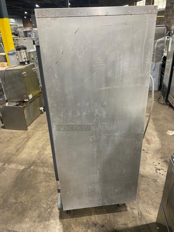 Metro C5-1 Series heated cabinet, Model C519-CFC-U, single glass door, 120V, non-insulated, on casters, scratches visible.