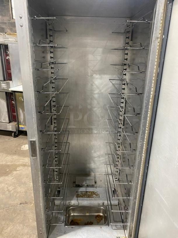 Metro C5-1 Series heated cabinet, model C519CFCU, with single glass door, on casters. Visible shelf racks inside. 120V.