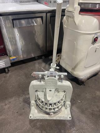 Dutchess Commercial Manual Dough Divider, Model BMIH, heavy-duty, metal construction, lever mechanism, fair used condition.