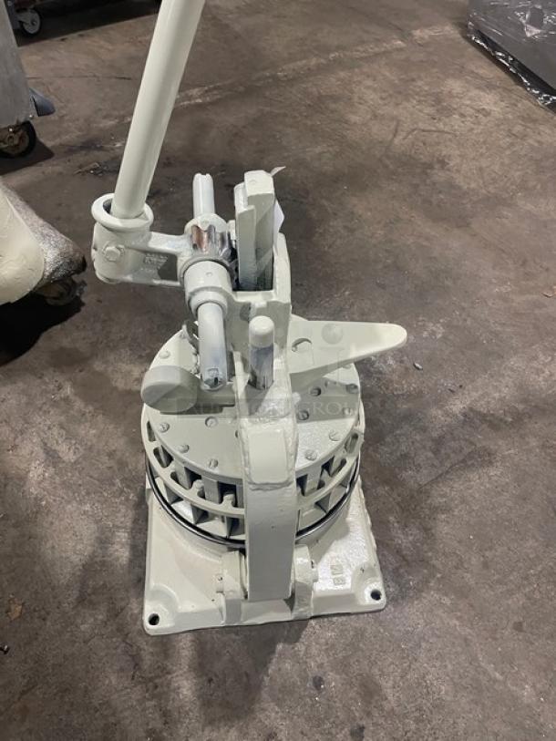 Dutchess BMIH commercial manual dough divider, heavy-duty, metal construction, used condition, gear mechanism visible.