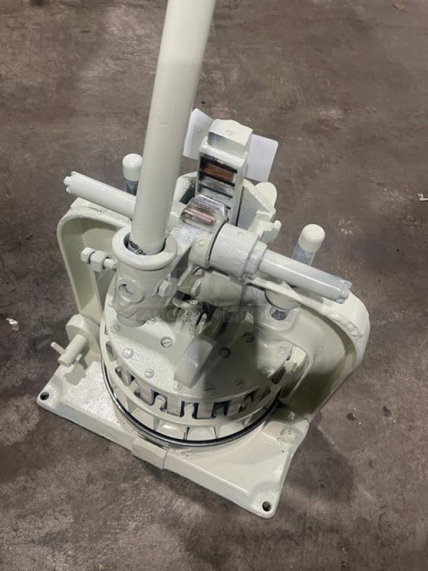 Dutchess Commercial Heavy-Duty Manual Dough Divider, Model BMIH. Features sturdy metal construction, manual operation handle.