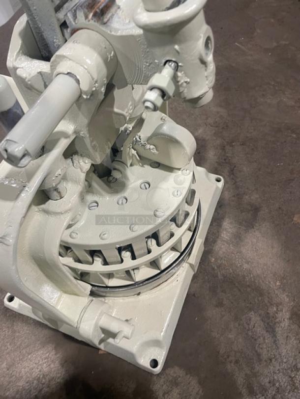 Dutchess Commercial Manual Dough Divider, Model BMIH, heavy-duty, off-white, used condition, sturdy metal construction.