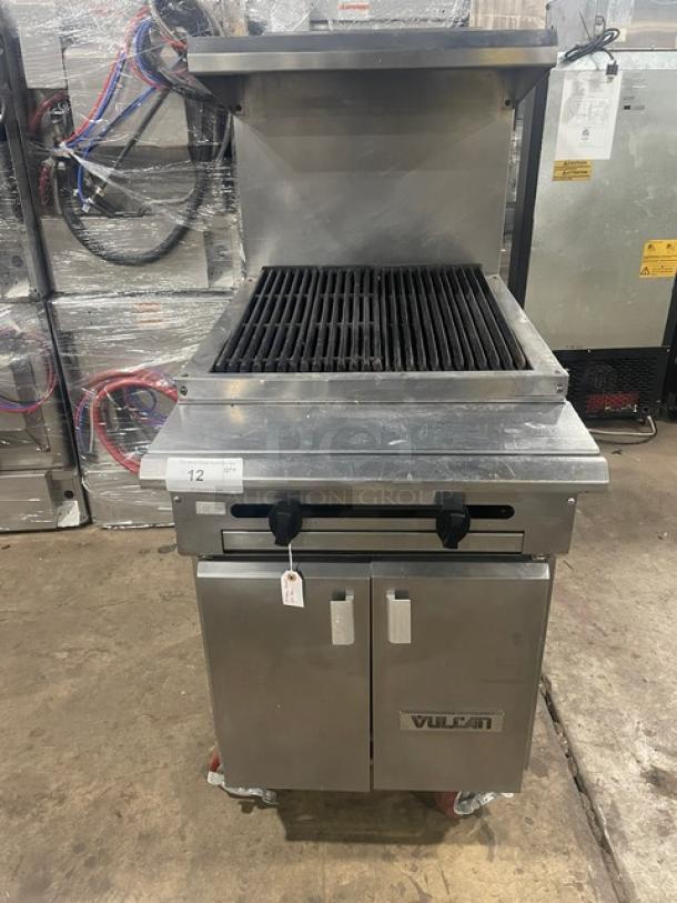 Vulcan VCBB24B stainless steel char broiler range, natural gas powered, with cabinet storage base, backsplash, overhead salamander shelf, on casters.