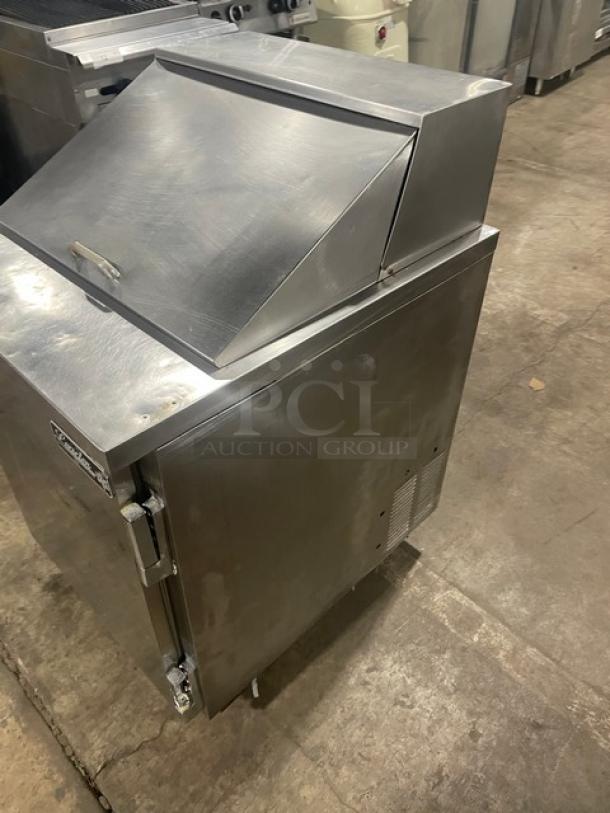 Leader Refrigerated Bain Marie Prep Table, Model NSFM27, stainless steel, single door, on casters, poly coated rack.