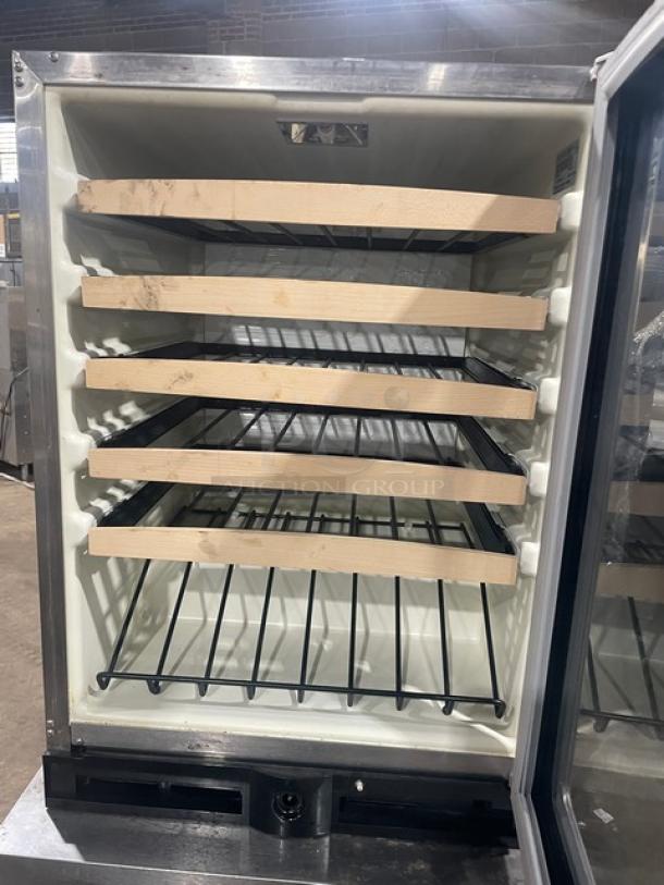 U-Line Stainless Steel Single Glass Door Beverage Center, Model U2075WCS00, five wooden shelves, clean interior.
