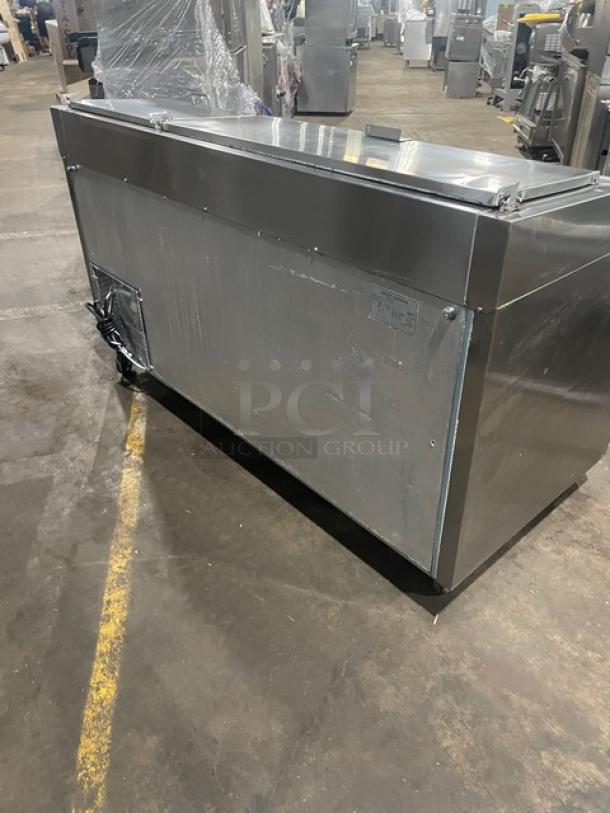 Entree P70 refrigerated pizza prep table, stainless steel, 2 doors, poly-coated rack, on casters, 115V 1-phase.
