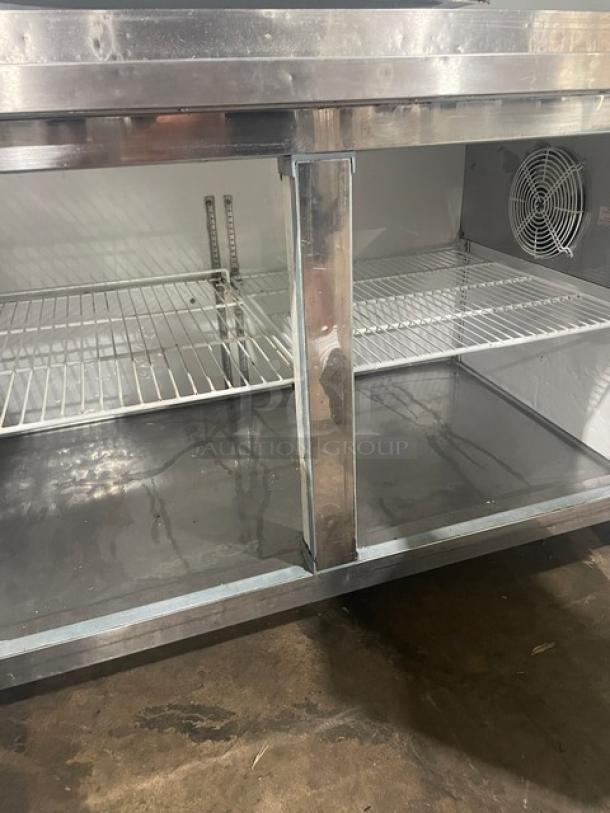 Entree P70 bain marie style pizza prep table, stainless steel, 2-door, poly coated wire rack, model SN: 1707ENTH91921, on casters.