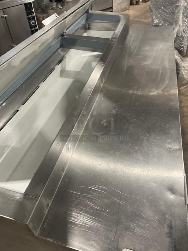 Entree P70 stainless steel 2-door refrigerated bain marie pizza prep table with poly-coated wired rack, on casters.