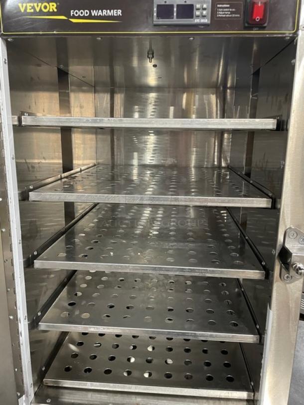 Vevor commercial stainless steel food warmer, electric-powered, digital controls, countertop model with legs, excellent condition.