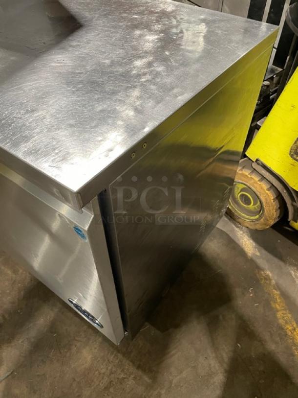 Leader UR61 stainless steel 2-door undercounter refrigerator, Energy Star certified, with poly-coated rack, on casters.