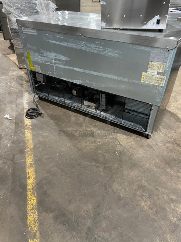 Leader UR61 2-door stainless steel undercounter worktop refrigerator. Energy Star certified, poly-coated wired rack, on casters.