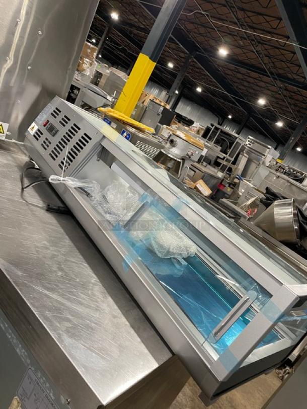 NEW Marchia MSU140S stainless steel 46" sushi merchandiser, curved glass, LED lights, double sliding doors, model SN: 1301302100045.