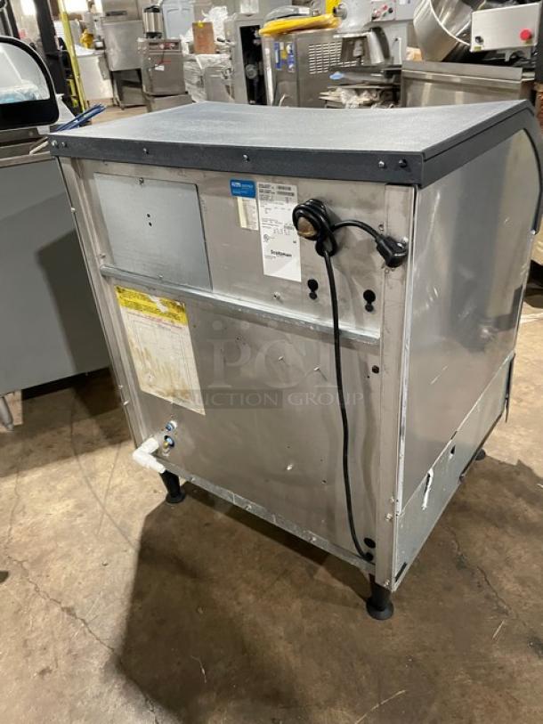 Scotsman Prodigy CU3030SW-1E stainless steel undercounter ice maker/bin combo, 115V, on legs. Model and serial labels visible.