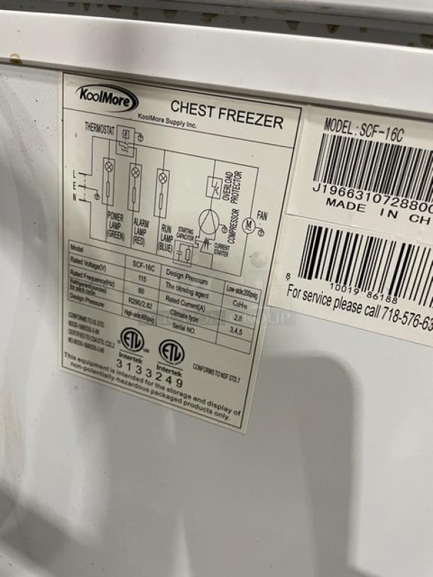 KoolMore SCF16C 60" white chest freezer, poly coated wired basket, 115V. Features model label and specifications.