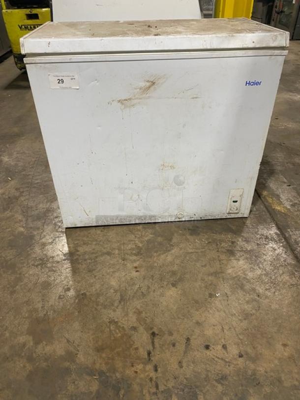 Haier HE71CL53NW chest freezer, standing, white, hinged lid, visible wear, 115V, commercial use, working condition.