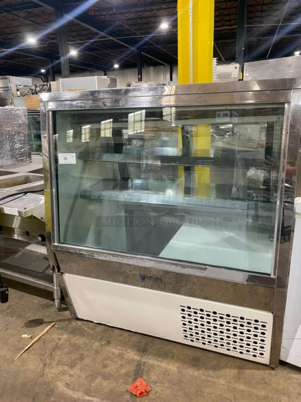 Custom Cool DEL4SC stainless steel refrigerated deli merchandiser with slanted glass, double sliding doors, and lower storage.