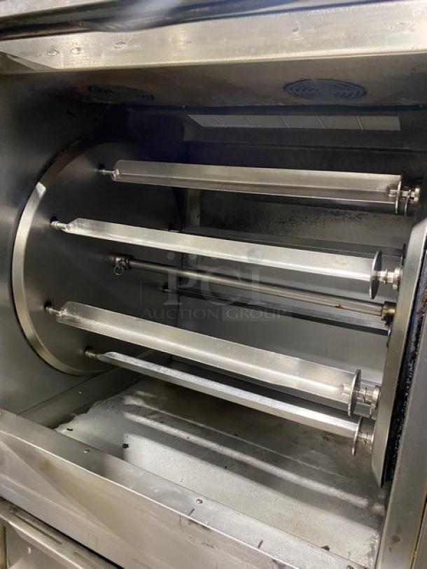 Cleveland Range BMR-32 stainless steel gas rotisserie oven interior with spits, commercial-grade condition.