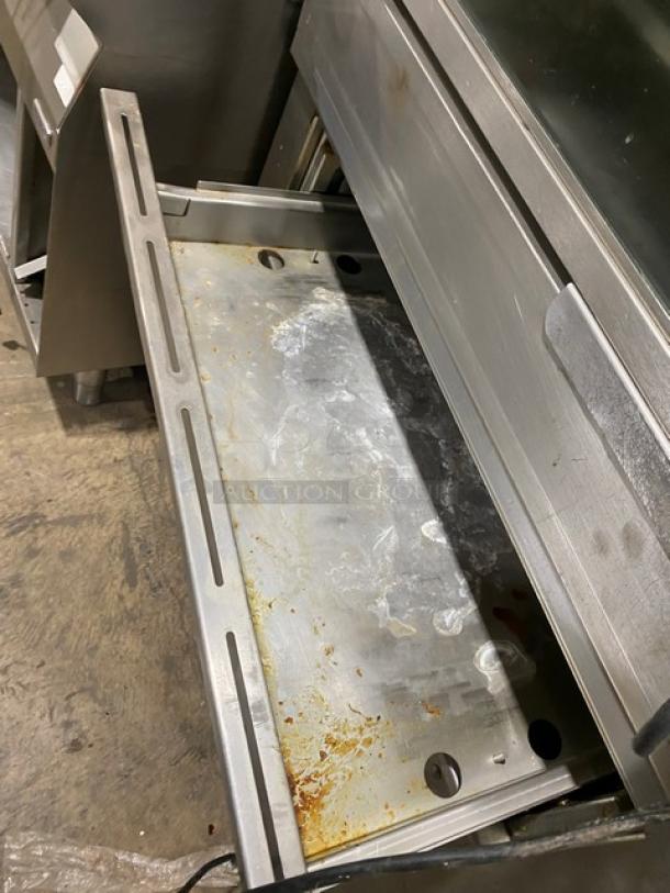 Cleveland Range stainless steel rotisserie convection oven BMR32 with hot food storage BMW334, showing one open drawer.